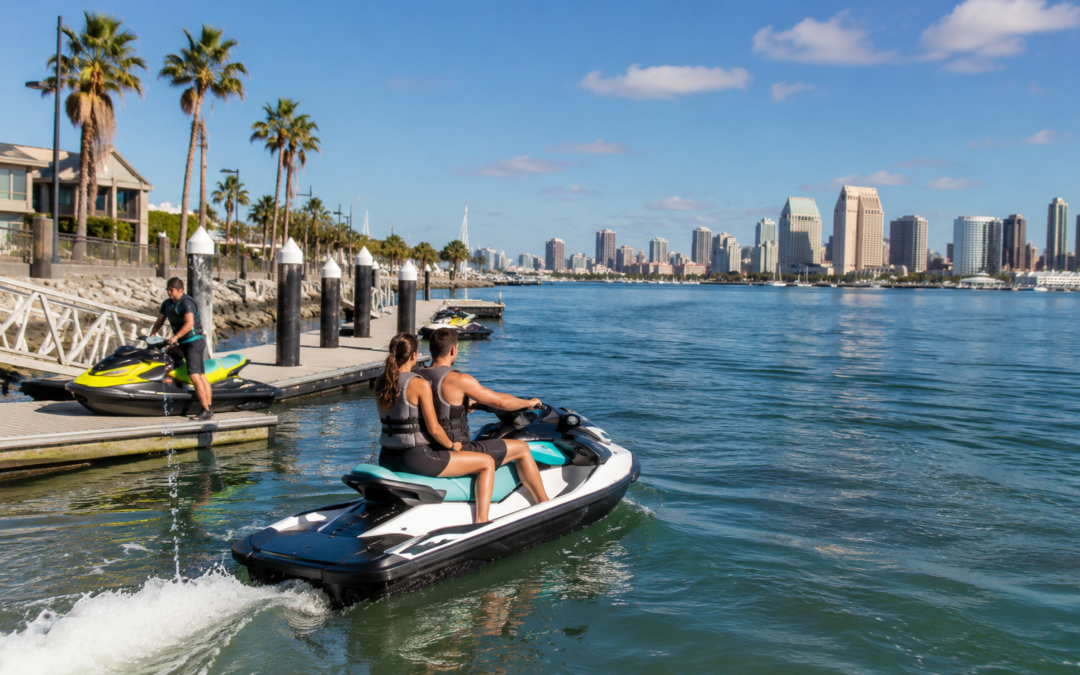 Jet ski riders launching from Coronado Ferry Landing on San Diego Bay with the downtown San Diego skyline in the background.